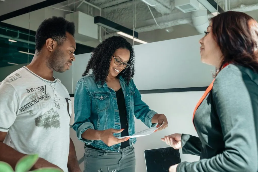 Professionals reviewing a legal document in an office